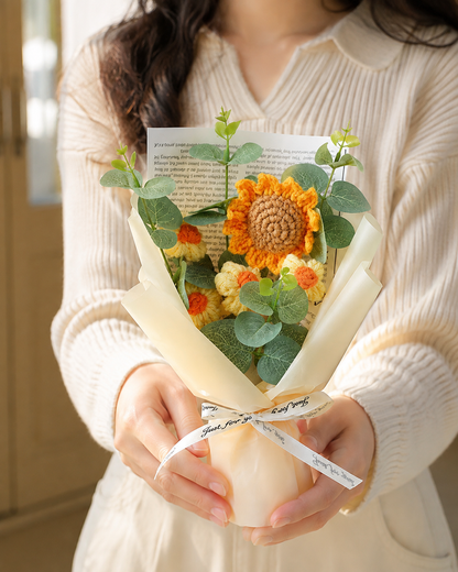 Woman presenting a hand-knitted wool sunflower bouquet